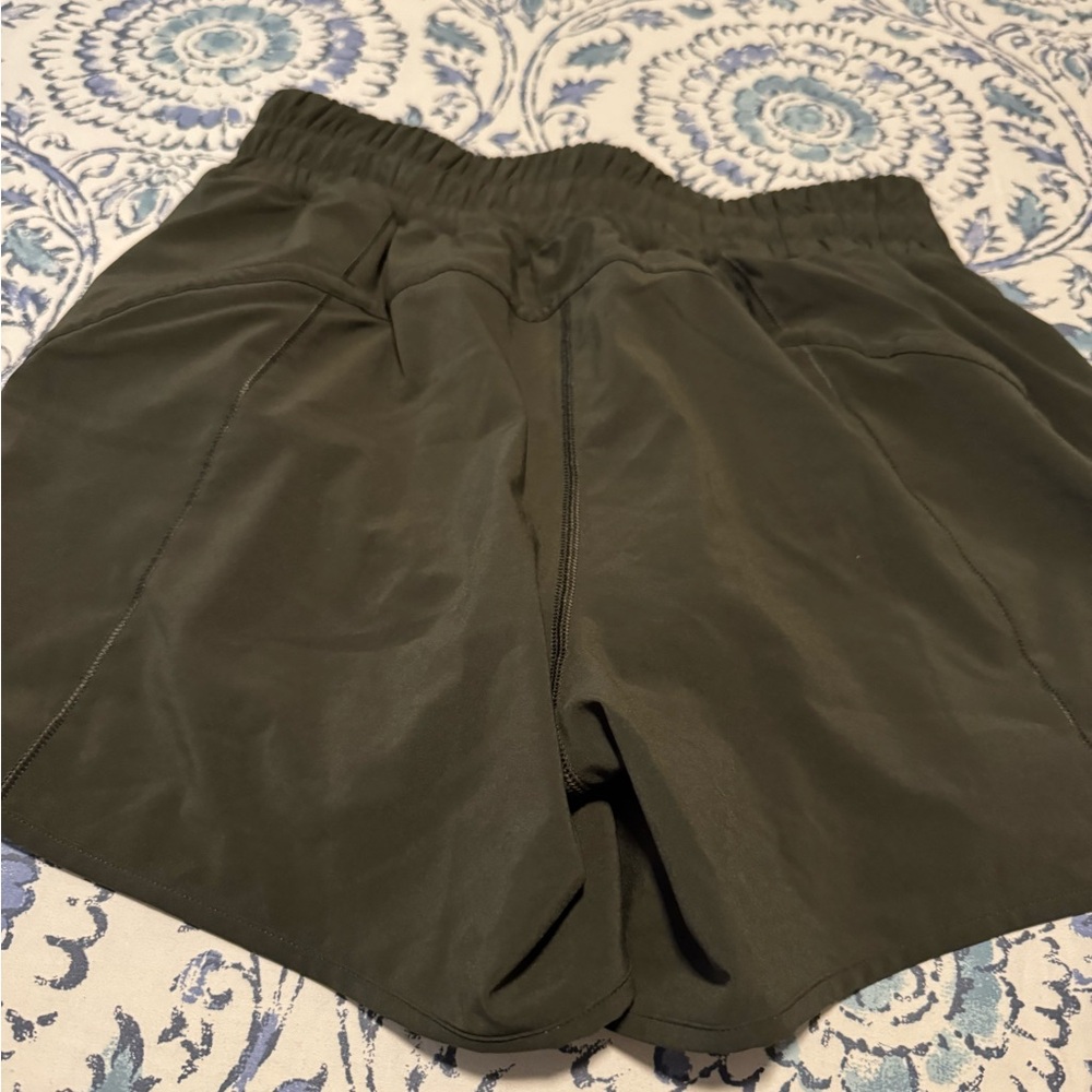 Woman’s Lululemon 5 inch lined track
Shorts Athletic Shorts Dark Green